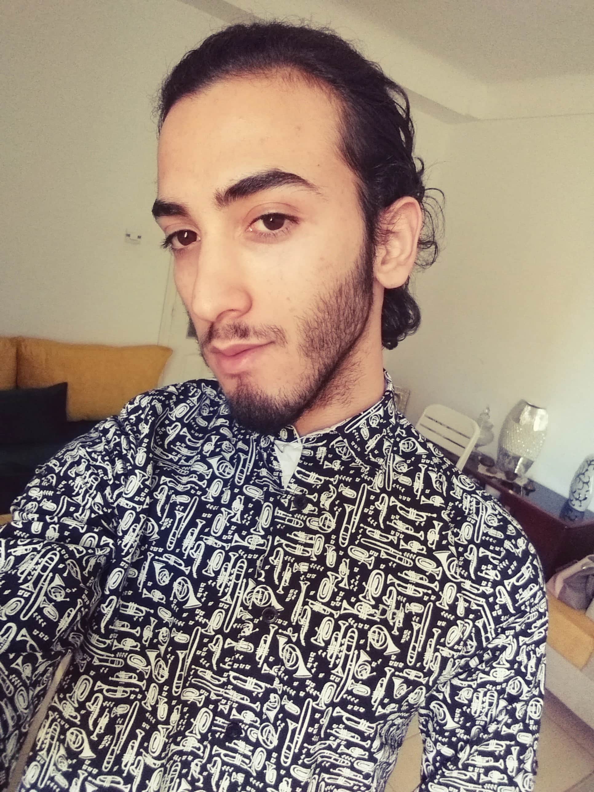 Portrait of Riad, web developer and content creator